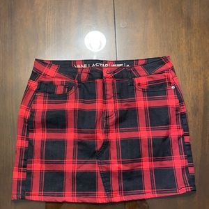 A mini plaid skirt. Never worn and is in perfect condition